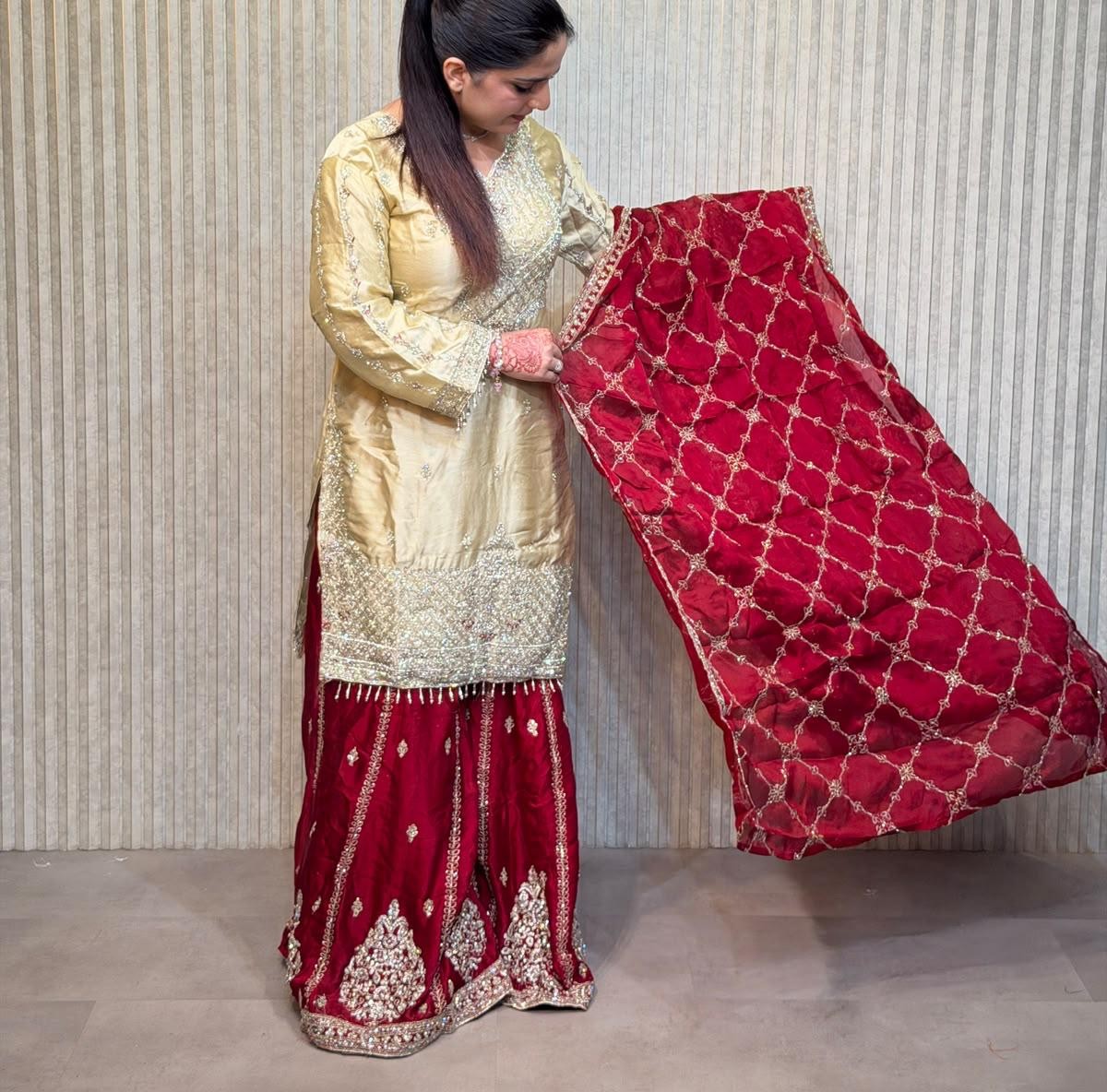 Cream and red Punjabi suit from Mohammadi Saree House
