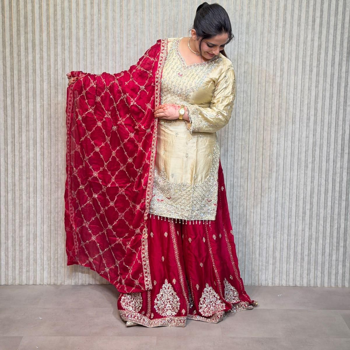 Cream and red Punjabi suit from Mohammadi Saree House